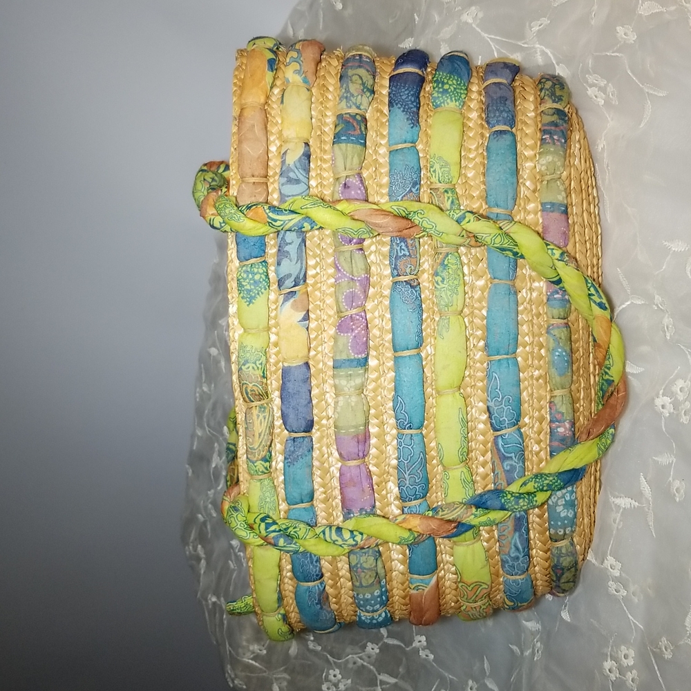Cappelli  straworld woven straw and fabric accents and lined bag pastel …